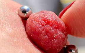 Playing Pierced Nipples Close up on Balcony